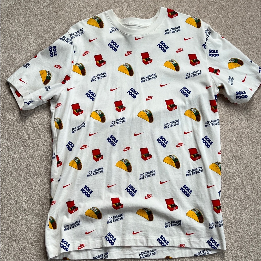 Nike tee White Graphic T-Shirt with Red and Yellow Accents